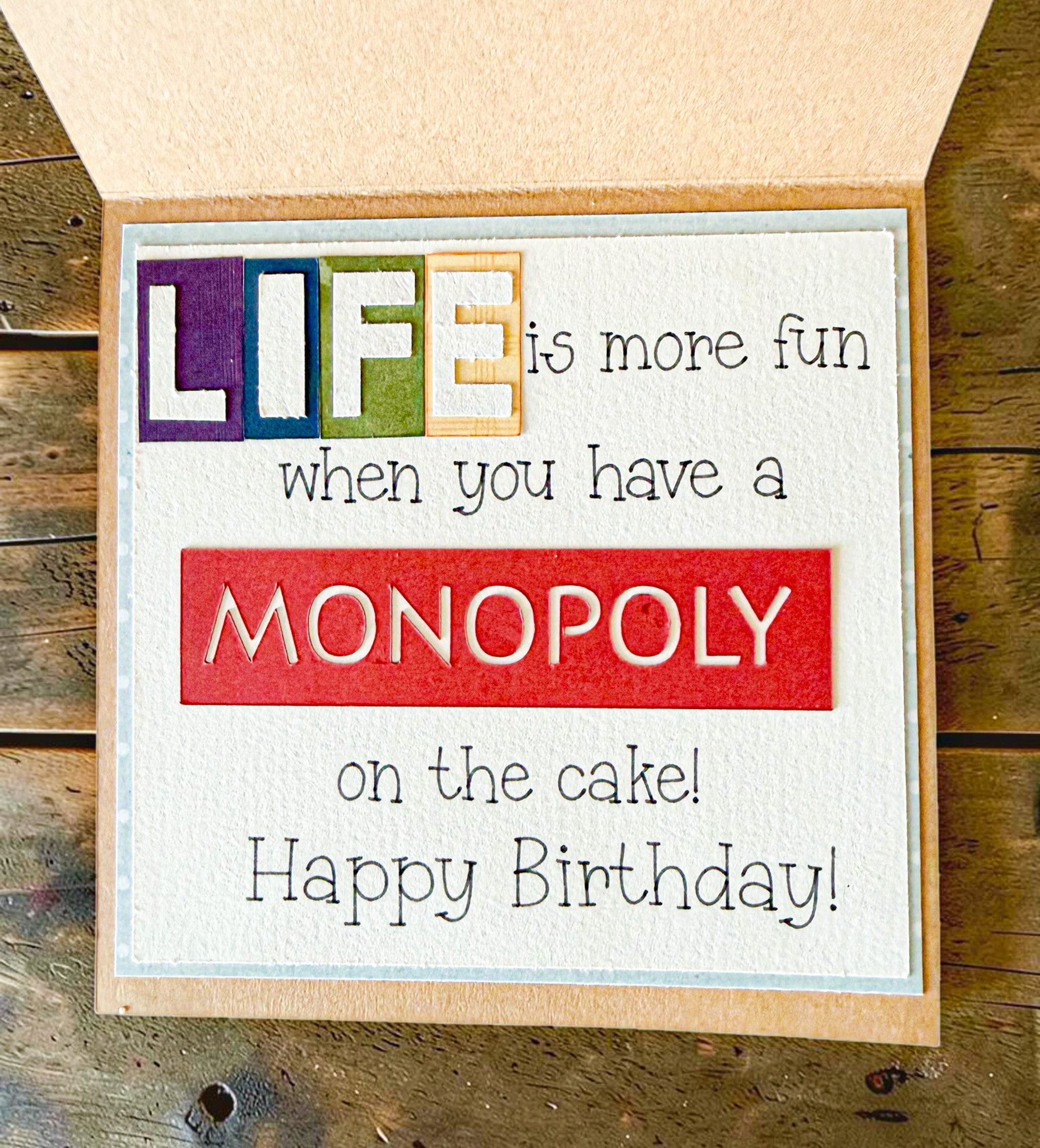Farmhouse Whimsy board game birthday greeting card featuring colorful game-themed illustrations on a festive card.