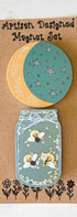 Firefly and moon magnet set from Farmhouse Whimsy, featuring whimsical metal magnets with vibrant firefly and moon designs.
