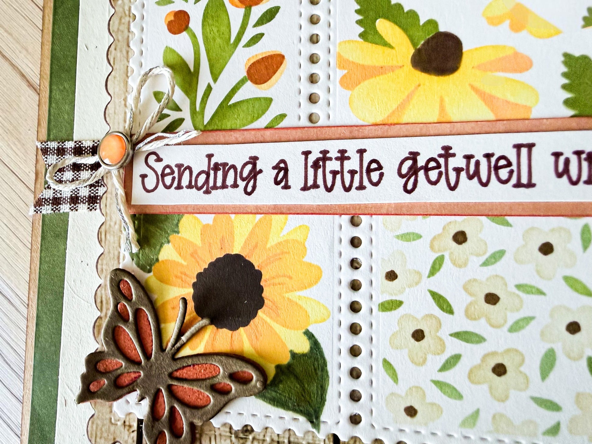 Close-up of a floral get well soon greeting card by Farmhouse Whimsy featuring colorful, detailed floral illustrations.