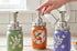 Hummingbird mason jar soap dispenser with vintage-style design and floral accents, perfect for farmhouse kitchen decor.