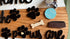 Wooden pet paws farmhouse door sign with rustic design, featuring paw print illustrations and "Farmhouse Whimsy" branding.