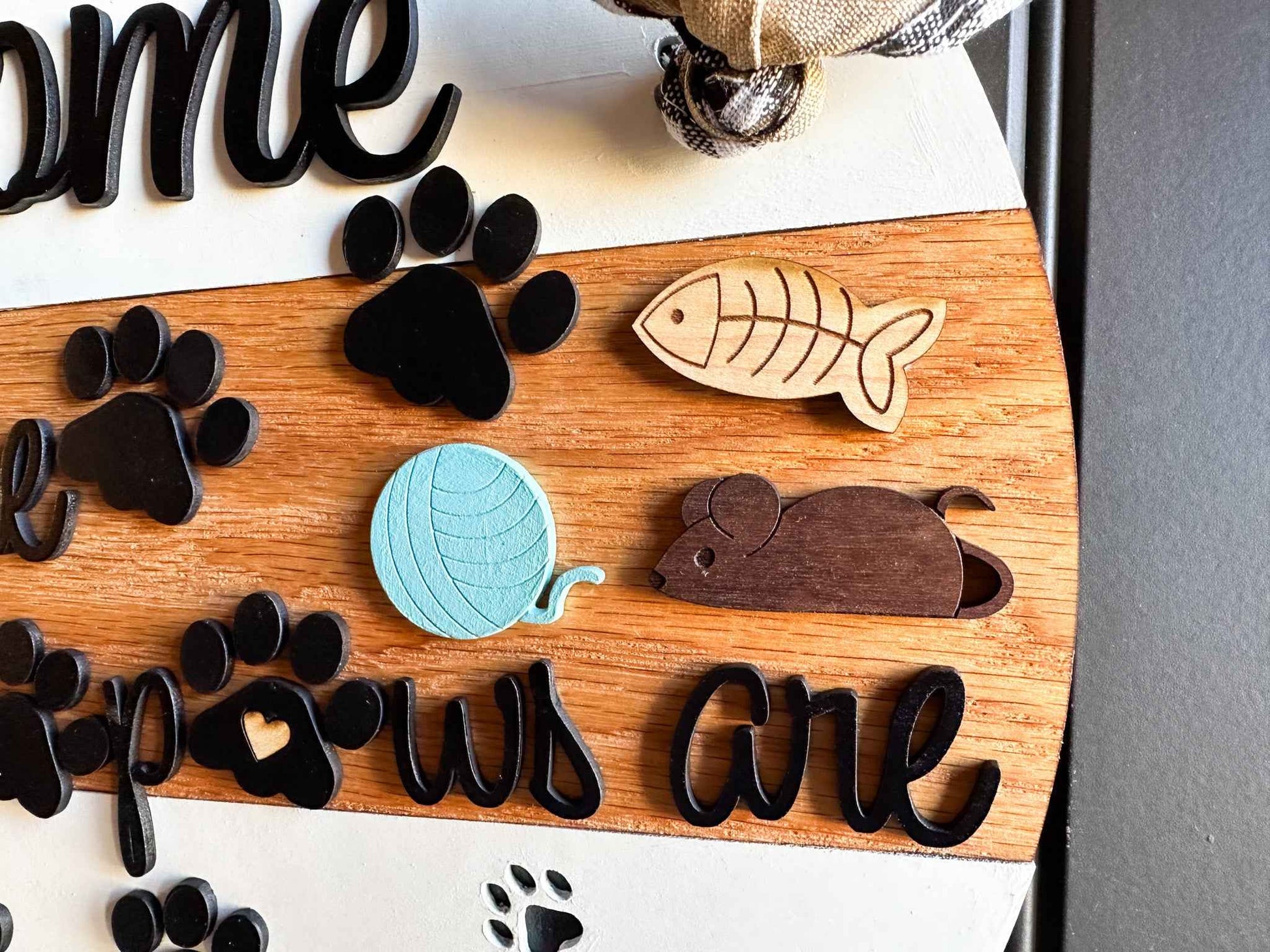 Wooden pet paws farmhouse door sign with rustic design, featuring engraved paw print and "Farmhouse Whimsy" branding.