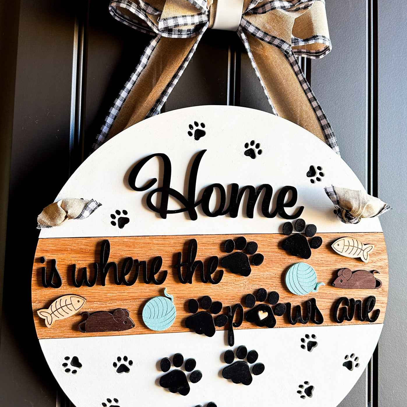 Wooden pet paws farmhouse door sign with rustic design, featuring paw prints and farmhouse style lettering.