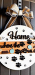 Wooden pet paws farmhouse door sign with rustic design, featuring paw prints and farmhouse style lettering.