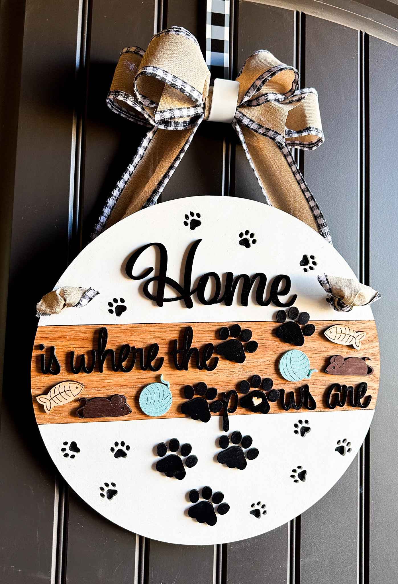 Wooden pet paws farmhouse door sign with rustic design, featuring paw prints and farmhouse style lettering.
