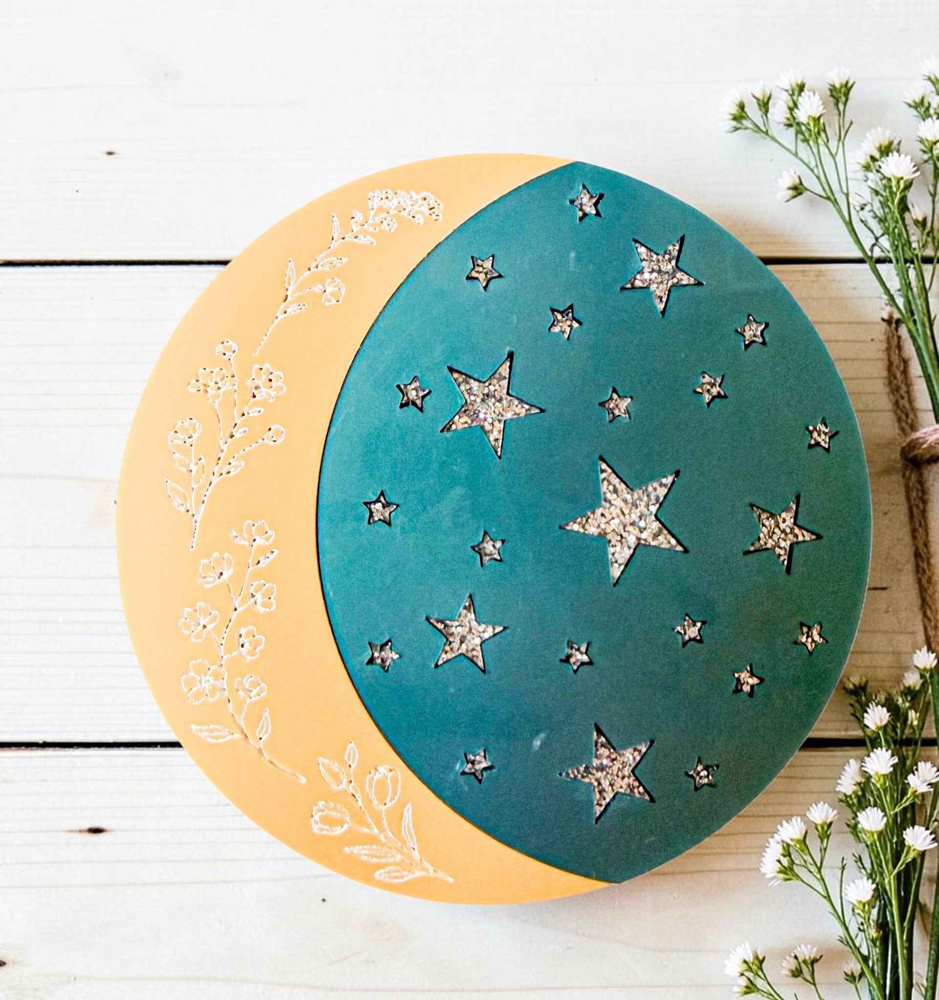 Farmhouse Whimsy firefly and moon star magnet set showing detailed moon and star designs on black background.