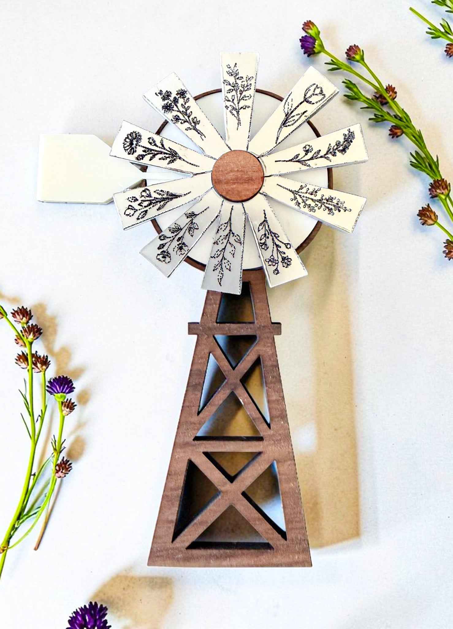 Farmhouse Whimsy windmill and wagon wheel magnet set showing vintage-inspired metal magnets with detailed designs.