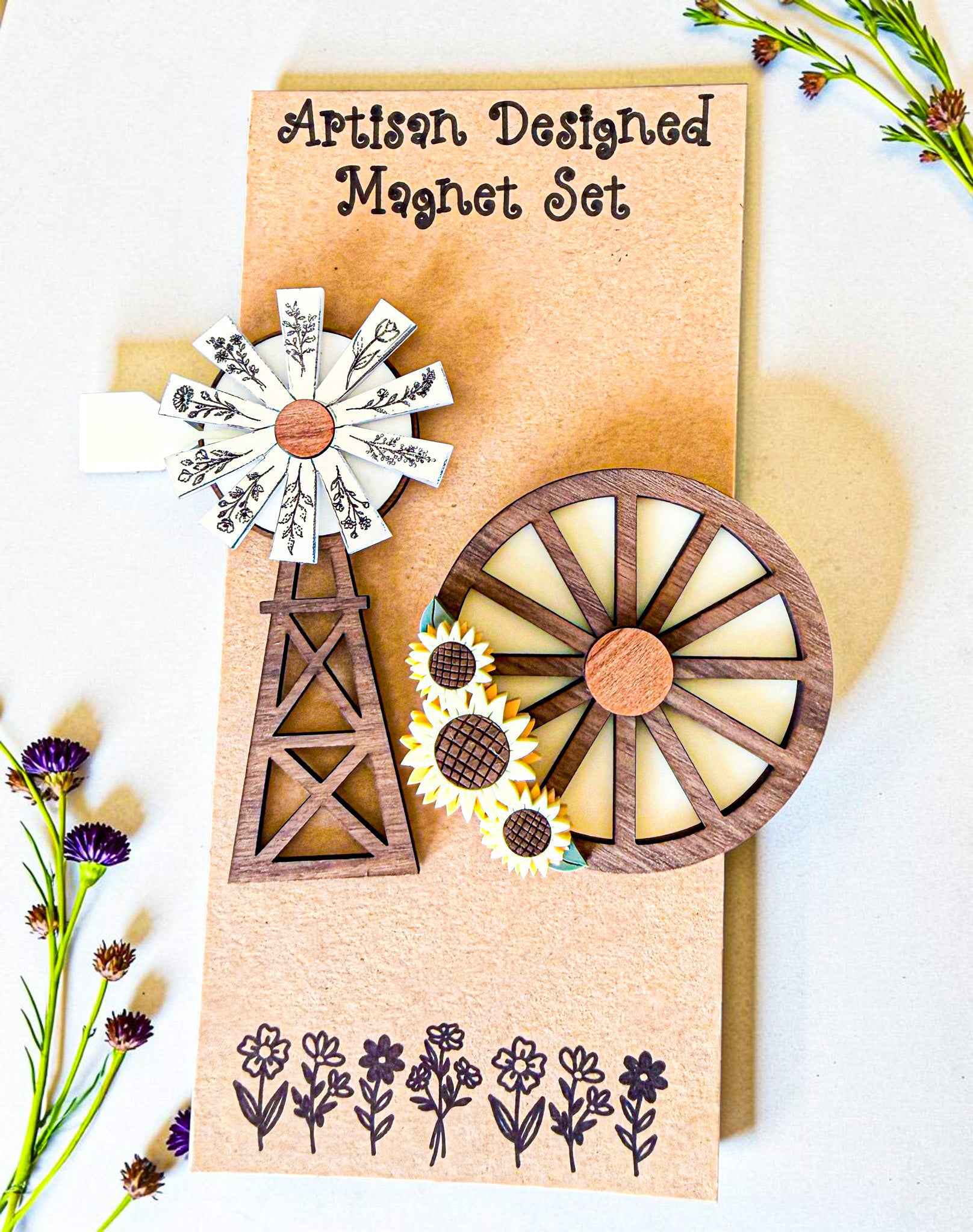 Farmhouse Whimsy Windmill and wagon wheel magnet set featuring detailed metal designs for farmhouse decor.