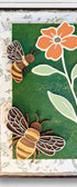 Set of Bumble Bee Wall Art by Farmhouse Whimsy featuring charming bee illustrations on rustic background.