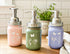 Farmhouse Whimsy butterfly mason jar soap dispenser with peach liquid soap and a pump, decorative farmhouse style soap jar