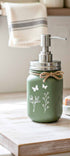 Farmhouse Whimsy butterfly mason jar soap dispenser with peach liquid soap and pump, decorative and functional soap jar.