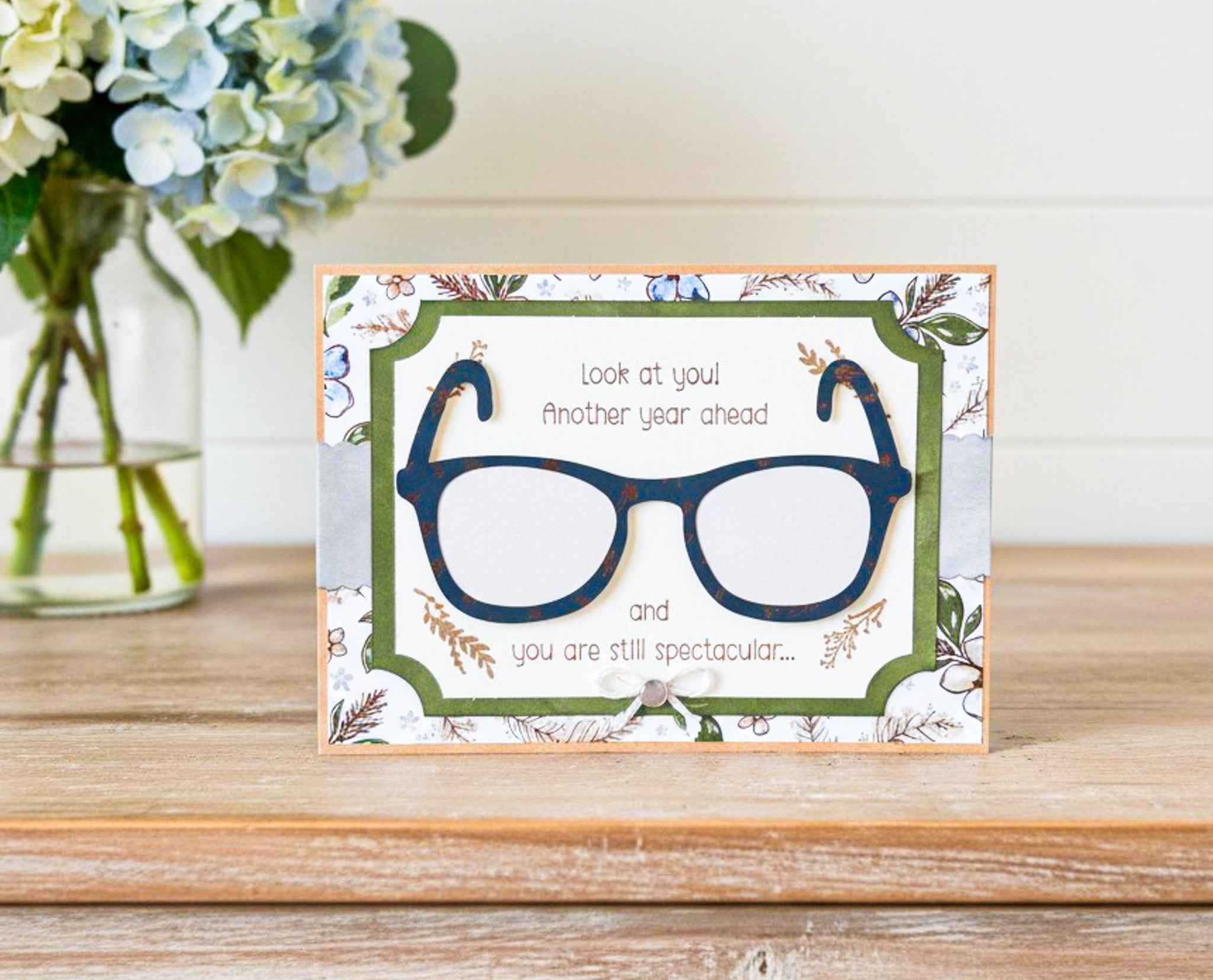 Farmhouse Whimsy humorous birthday greeting card featuring glasses design, perfect for celebrating with a fun, masculine touch.