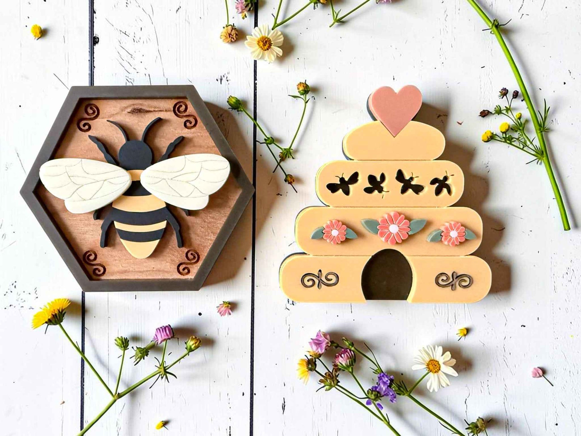 Bee and hive magnet set from Farmhouse Whimsy, featuring colorful bee and hive designs on a magnet collection.