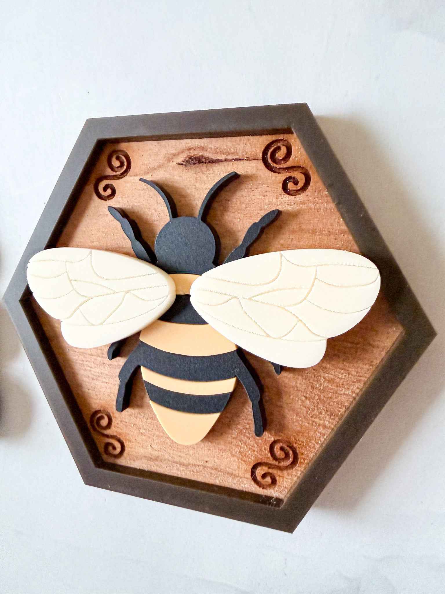 Farmhouse Whimsy Bee and Hive Magnet Set featuring colorful bee and hive designs on magnetic pieces.