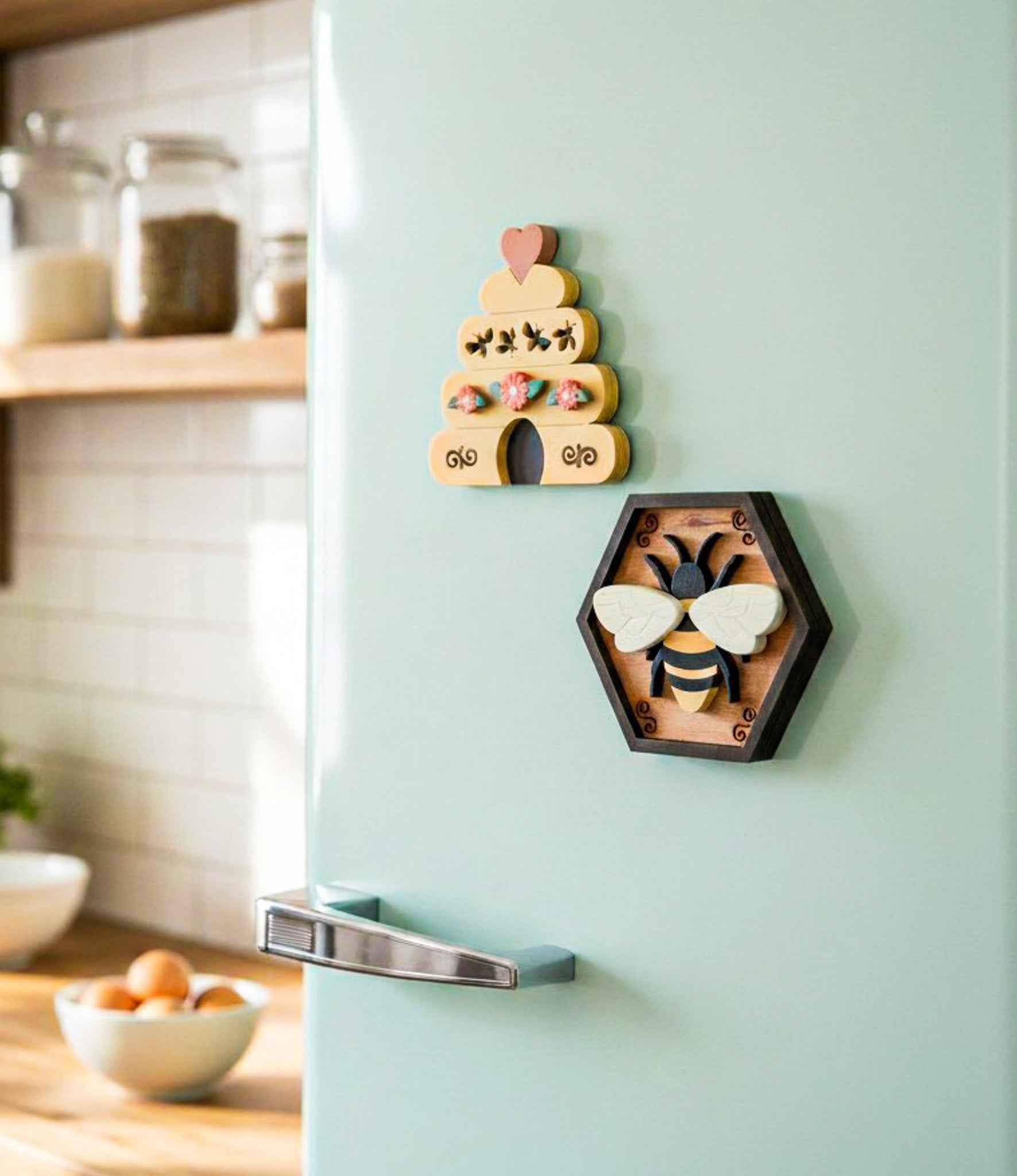 Farmhouse Whimsy bee and hive magnet set featuring colorful, handcrafted magnets with bee and hive designs on a rustic background.