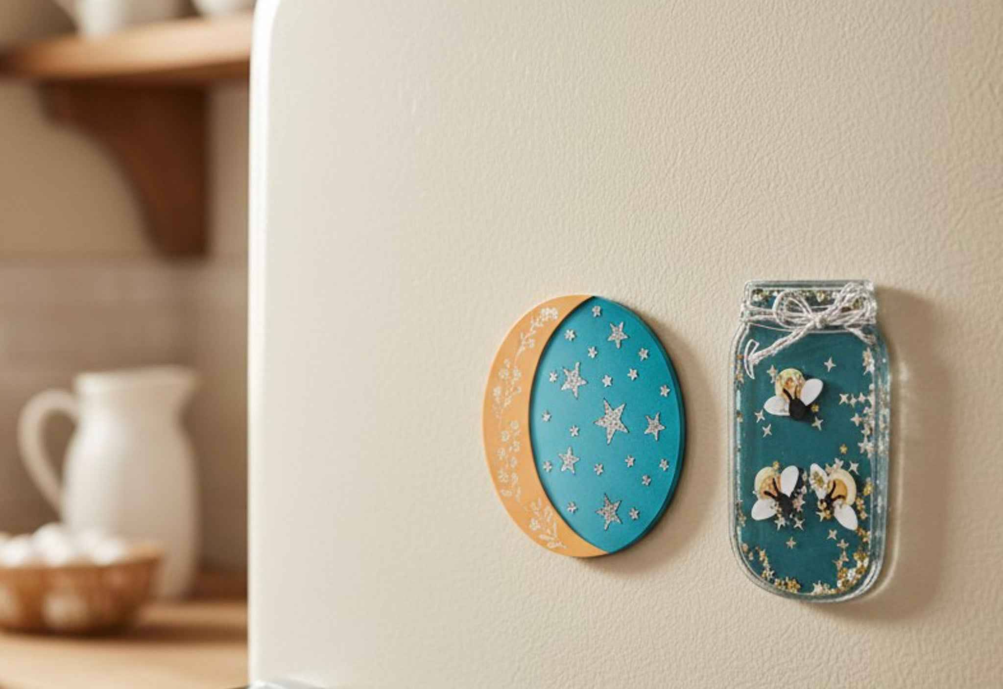 Farmhouse Whimsy Firefly & Moon Magnet Set featuring charming metal magnets with firefly and moon designs for fridge decor