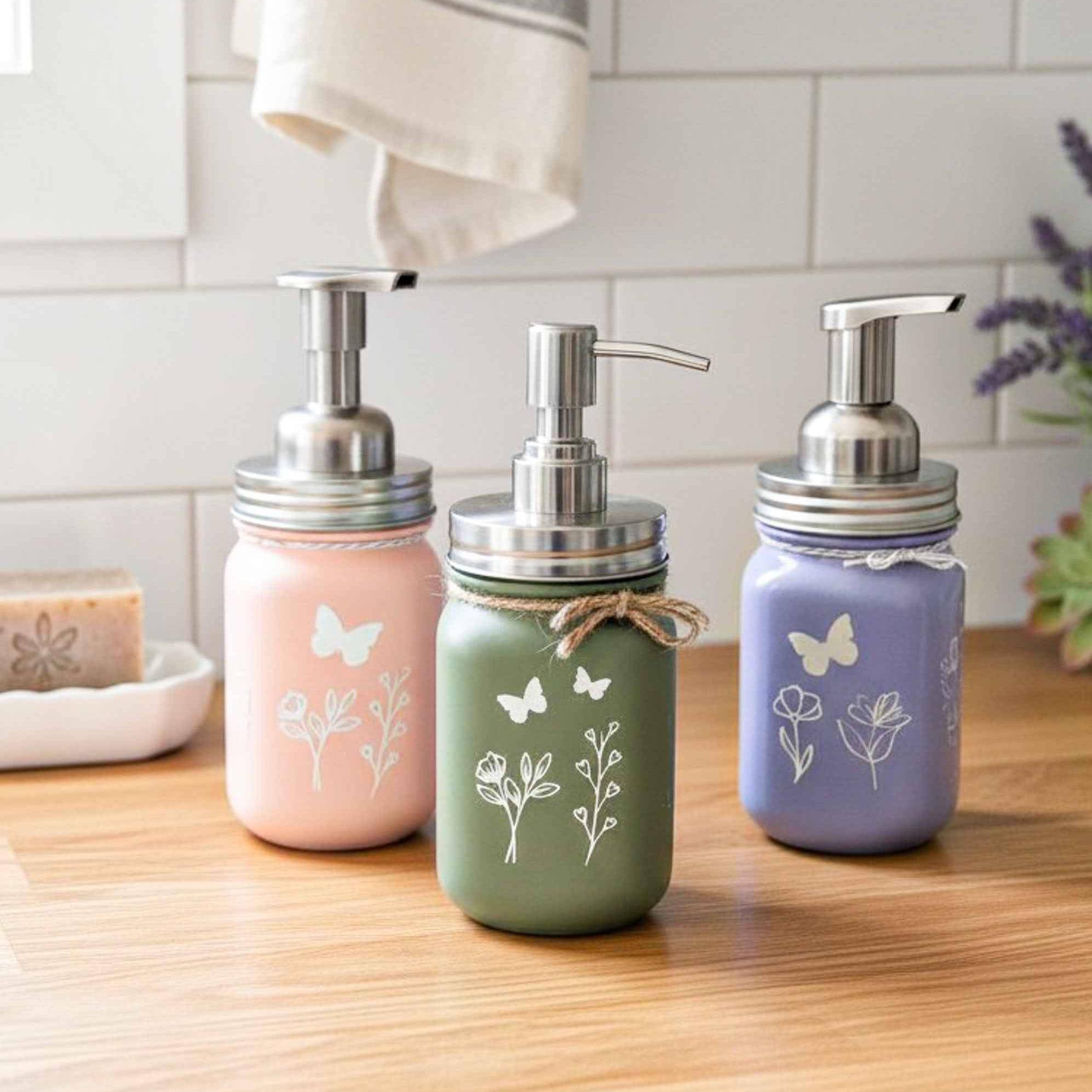Farmhouse Whimsy butterfly mason jar soap dispenser with peach liquid soap and a decorative pump, rustic farmhouse style.