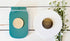 Close-up of Firefly & Moon Magnet Set by Farmhouse Whimsy, featuring whimsical firefly and moon designs on magnetic backing.