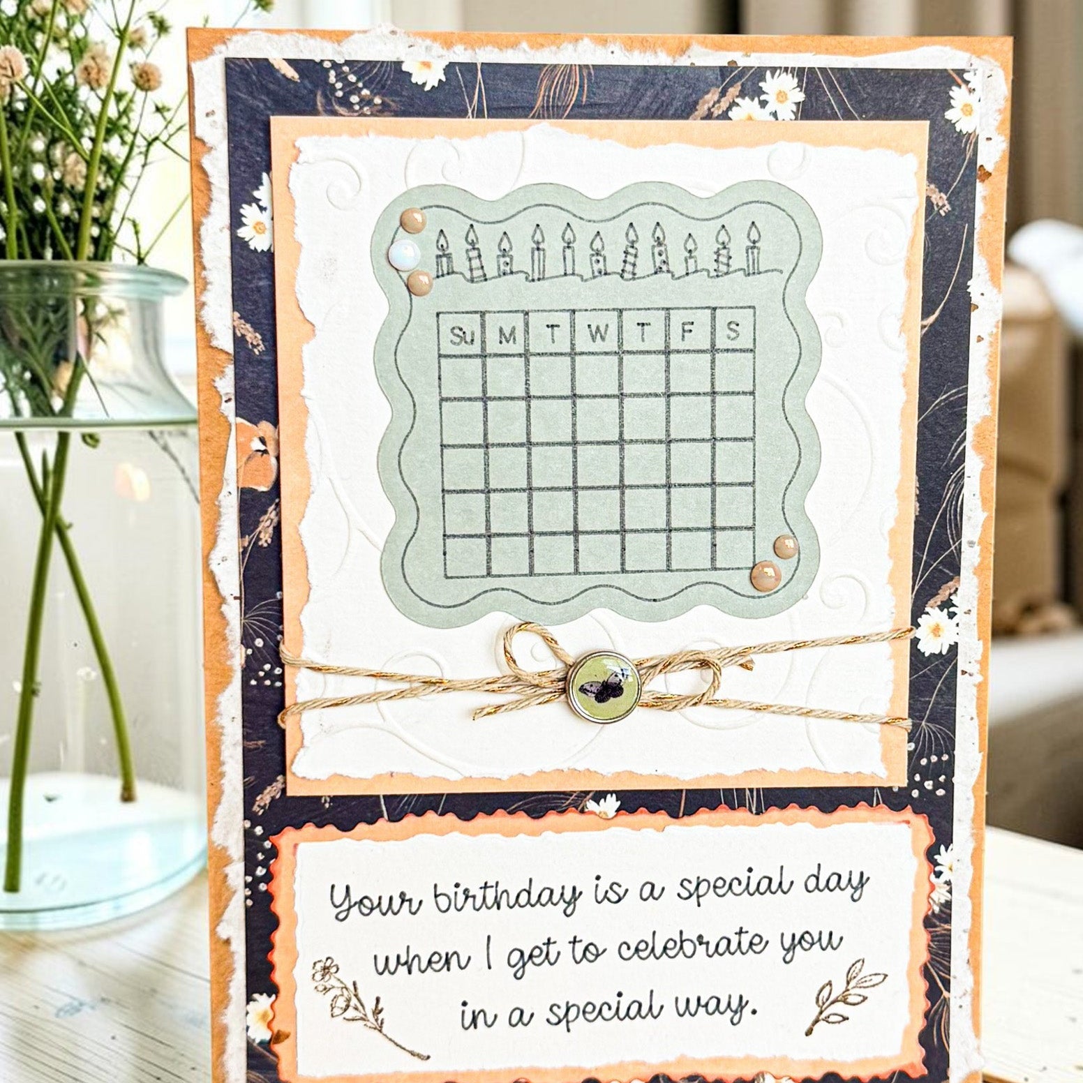 Rustic floral birthday greeting card by Farmhouse Whimsy with colorful flower illustrations on textured paper background.