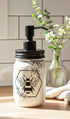 Cream and black Honey Bee Mason Jar soap pump by Farmhouse Whimsy showing a decorative glass soap jar with a pump dispenser.