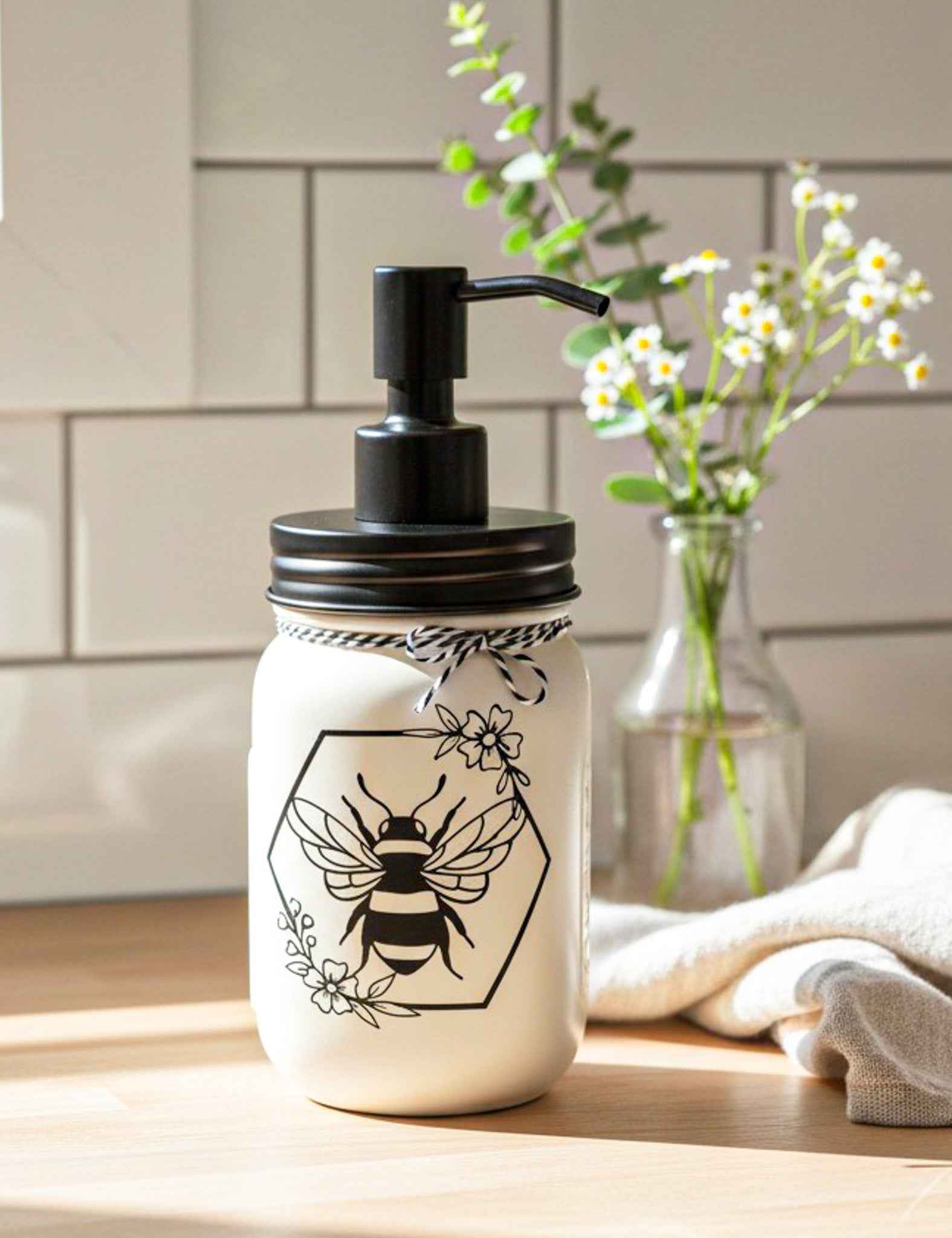 Cream and black Honey Bee Mason Jar soap pump by Farmhouse Whimsy showing a decorative glass soap jar with a pump dispenser.
