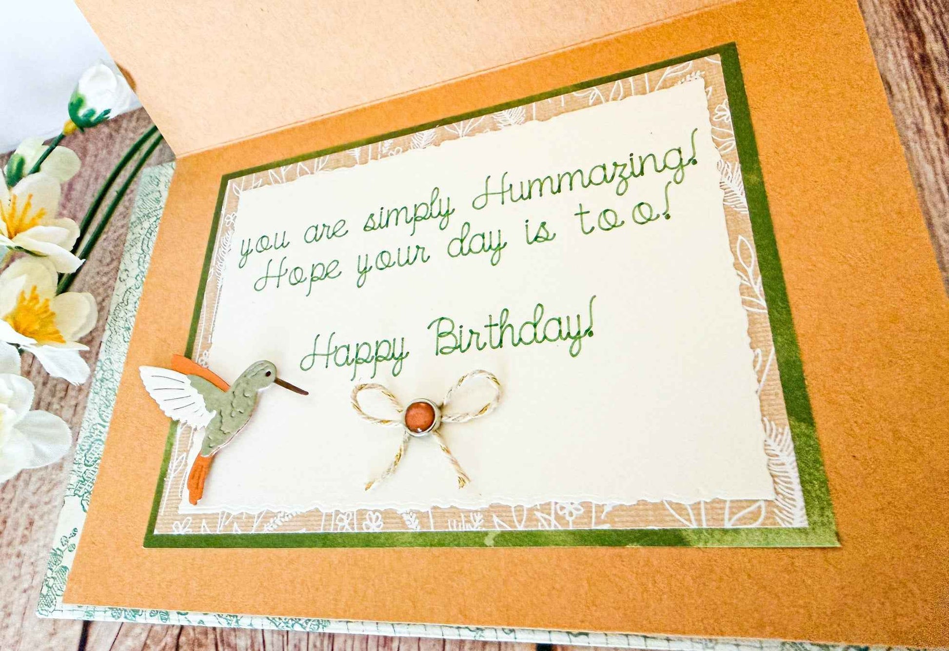 Farmhouse Whimsy hummingbird floral birthday greeting card with colorful flowers and a charming hummingbird illustration.