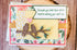 Love Birds Wedding Greeting Card by Farmhouse Whimsy featuring colorful love bird illustrations and floral accents.