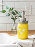 Farmhouse Whimsy sunflower mason jar soap dispenser with a rustic design and sunflower artwork on a white background.