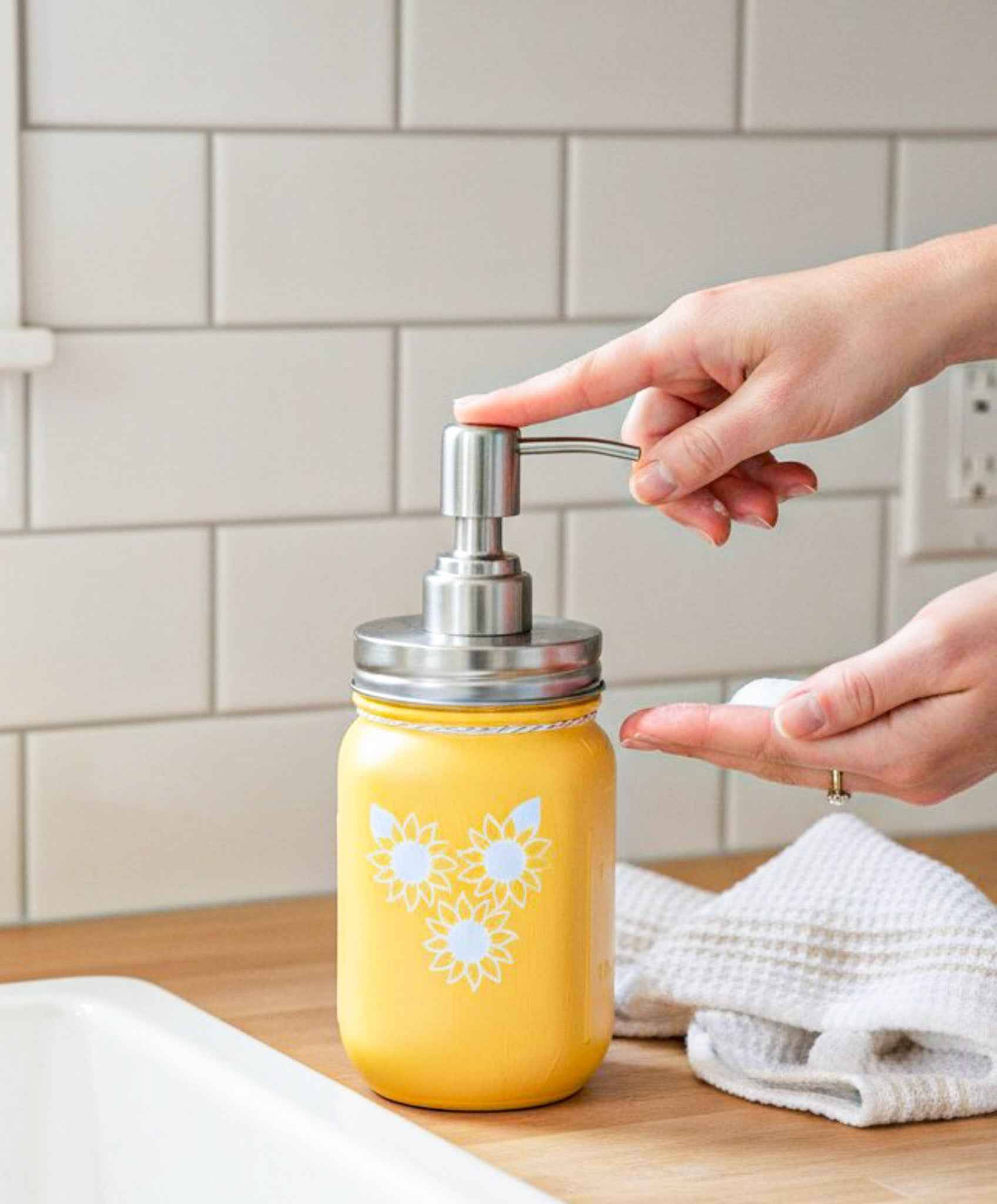 Farmhouse Whimsy sunflower mason jar soap dispenser, vintage-style soap jar with sunflower design for rustic decor.