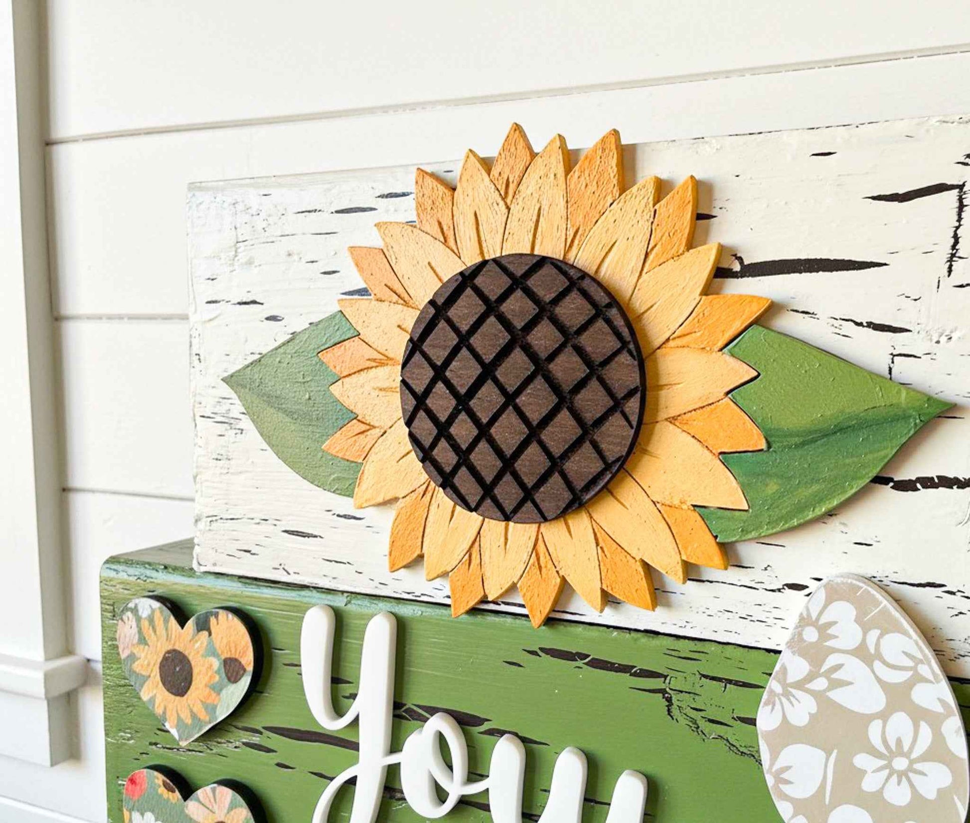Sunflower-themed table top decor set with tiered blocks from Farmhouse Whimsy, featuring bright sunflower illustrations.